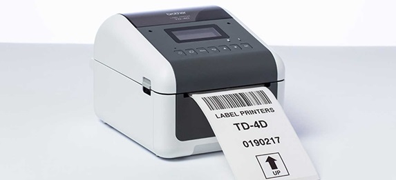 Brother TD label printer with label being printes