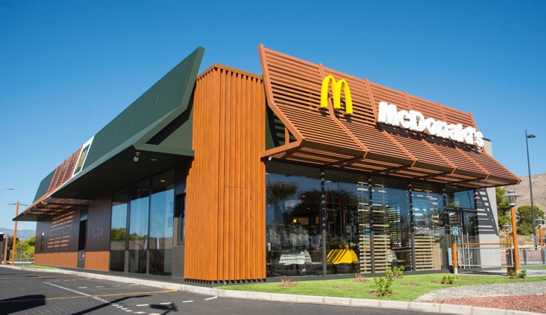 Exterior view of a McDonald's restaurant on a sunny day in Spain